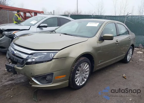 2012 Ford Fusion Hybrid z USA, uszkodzony, nr VIN 3FADP0L32CR191658